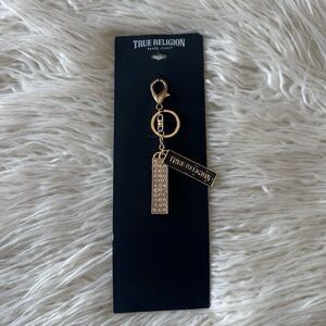 The True Religion Gold Rhinestone Key Chain/Bag Charm